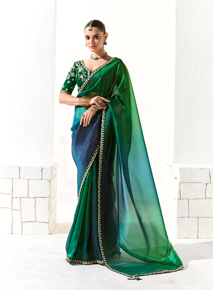 Dark Green organza tissue saree featuring detailed sequin embroidery