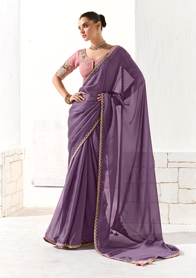 Lilac tissue saree with intricate sequin embroidery and a soft organza drape.