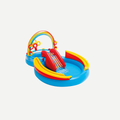 Inflatable toddler pool featuring a rainbow arch and built-in water slide in primary colors on a white background.