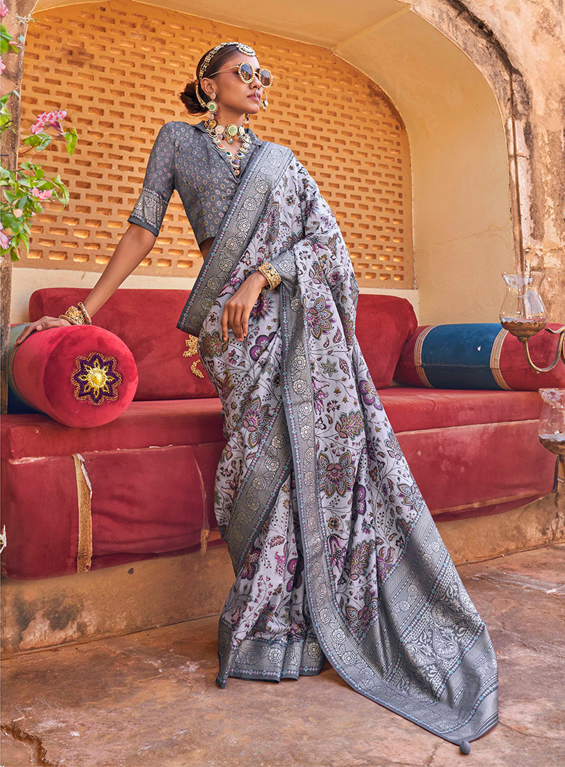 Monjolika Fashion light lavender and grey floral print silk blend saree with woven border