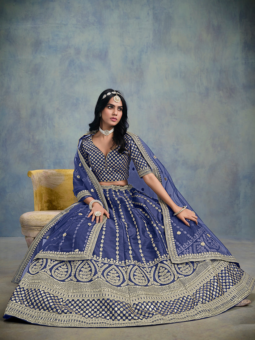 Elegant blue art silk lehenga choli with sequin embroidery for evening parties.