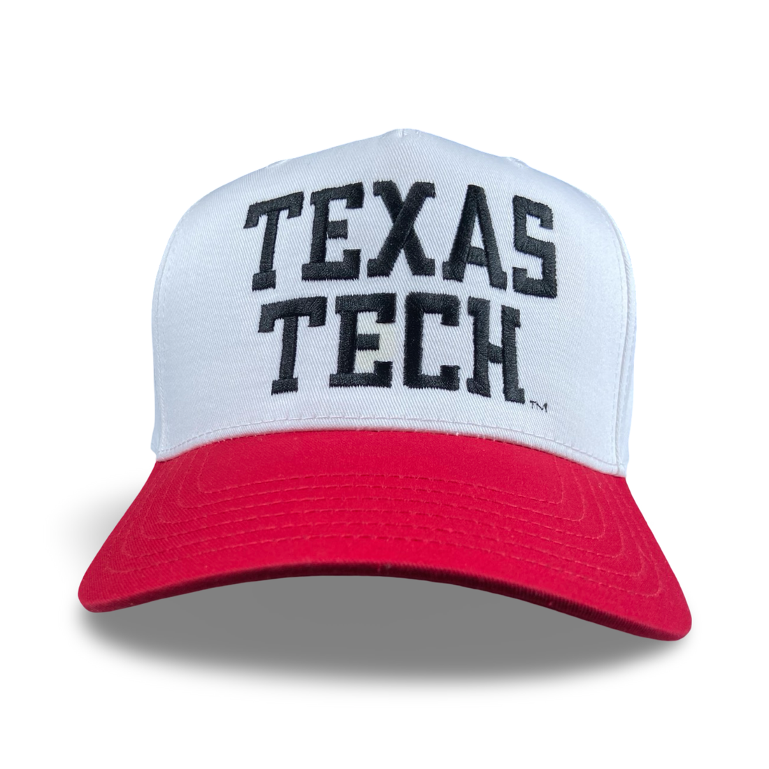 Texas Tech trucker hat with bold red, white, and black embroidery on a structured crown.