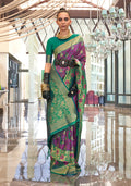 Green and magenta handloom silk blend saree with intricate weaving