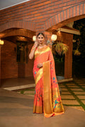 Vibrant orange Paithani silk saree with Zari woven patterns and matching blouse