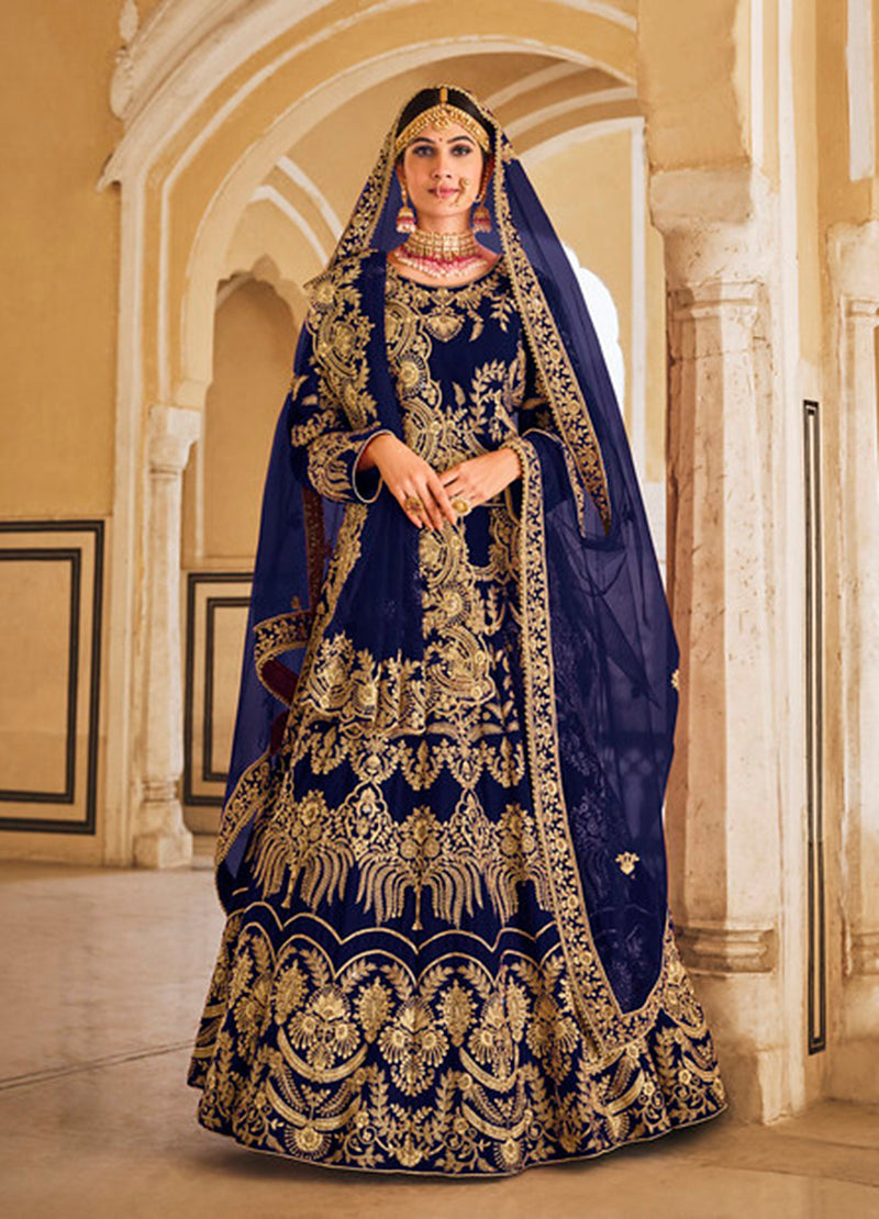 Navy blue velvet lehenga choli with intricate embroidery for wedding wear