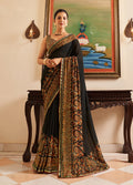 Black georgette designer saree with detailed paisley print, perfect for modern ethnic styling.
