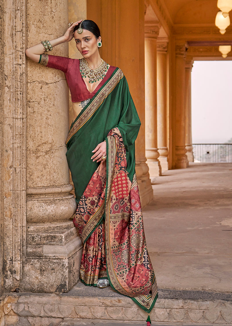 Green silk blend contemporary saree featuring elegant paisley print work.