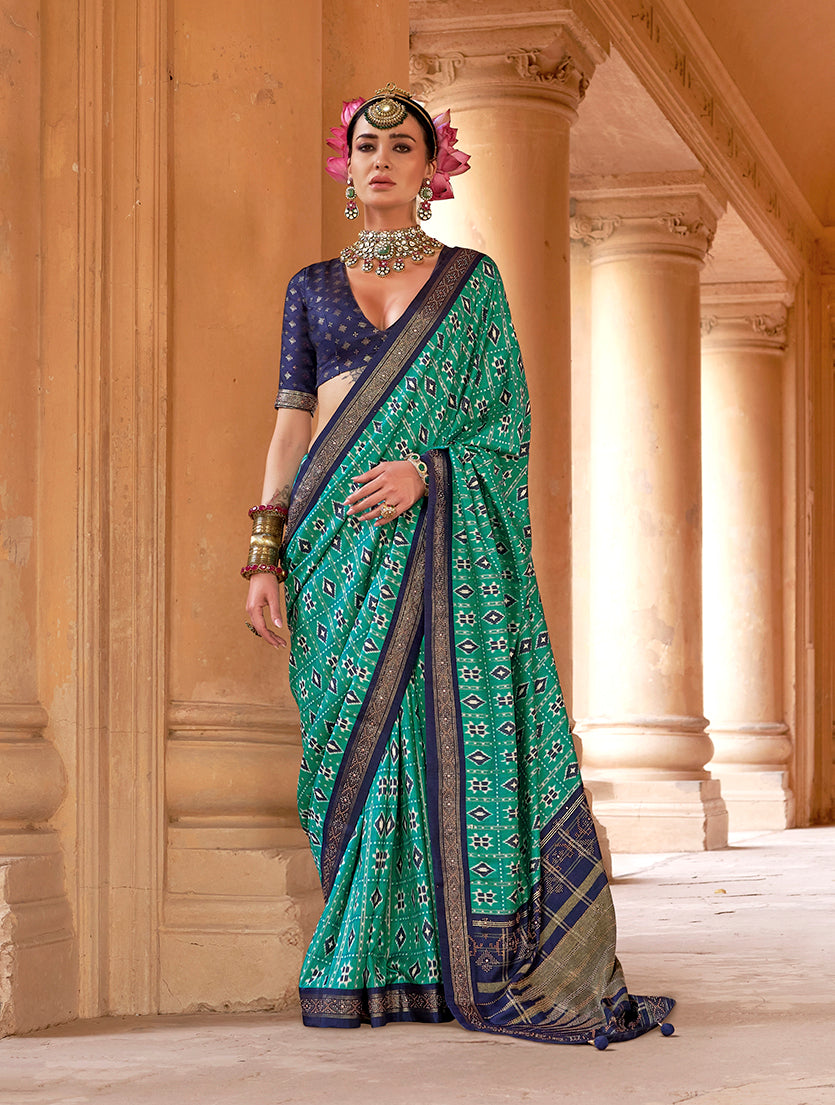 Turquoise silk blend saree with traditional Patola print