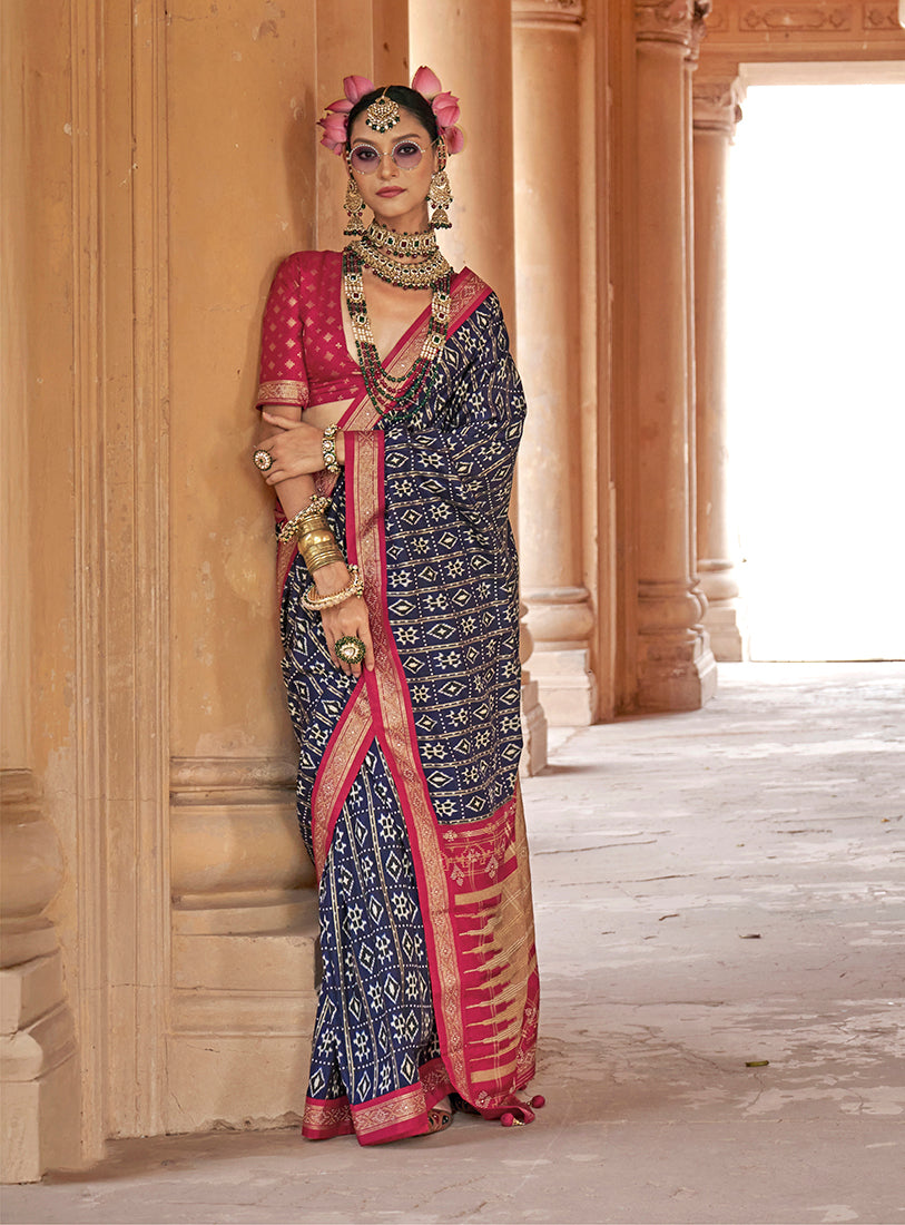 Navy blue saree with traditional Patola print in a silk blend fabric