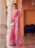 Beautiful pink georgette saree with intricate weaving patterns, perfect for party wear.