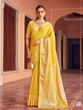 Yellow georgette party saree with detailed ethnic weaving patterns