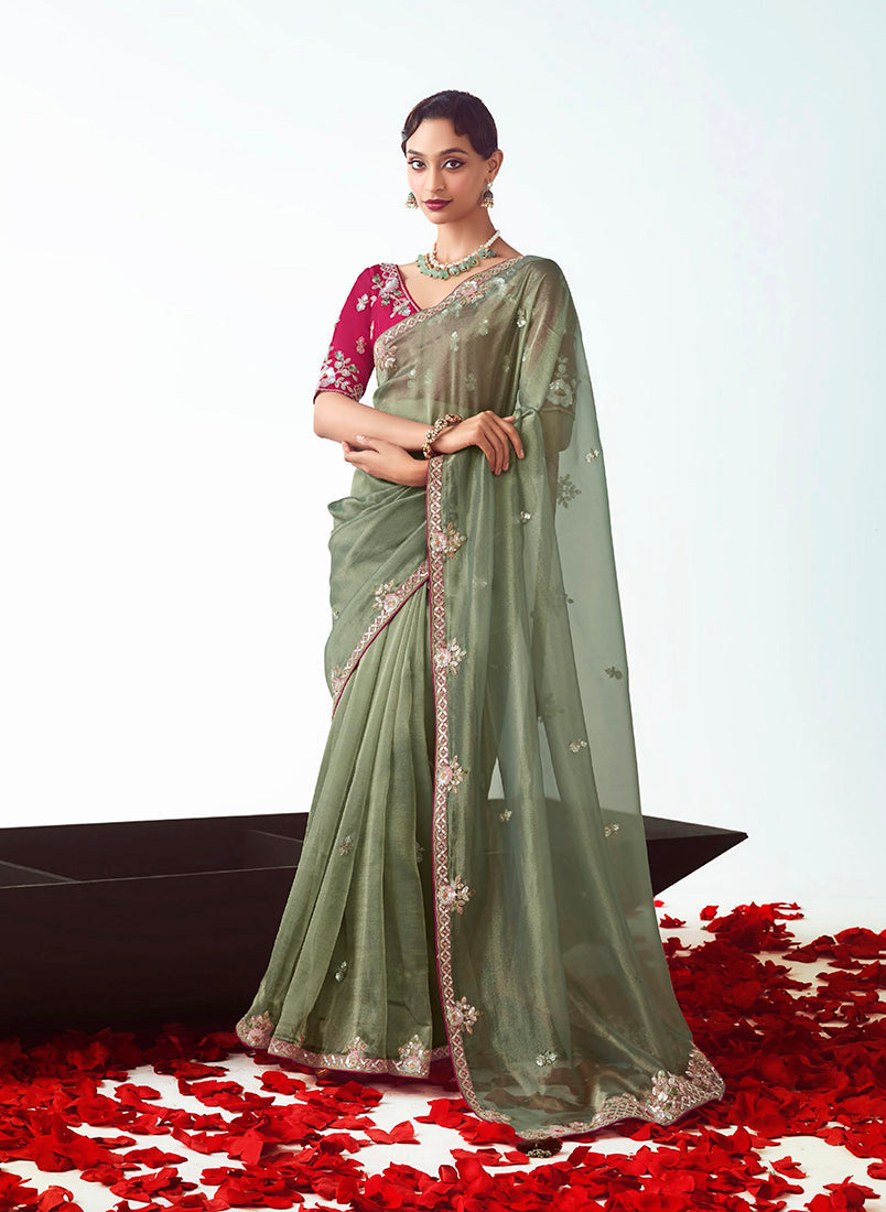 Sage green fancy fabric designer saree with elegant cut work embroidery