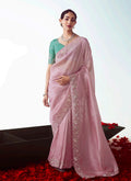Light pink fancy fabric designer saree with delicate cut work embroidery
