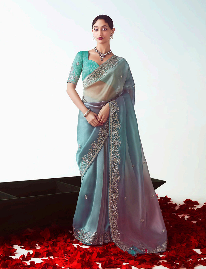 Multi-colour designer saree featuring intricate cut work embroidery on high-quality fancy fabric