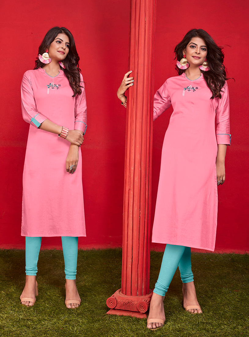 A graceful pink cotton kurti with detailed ethnic embroidery for party wear