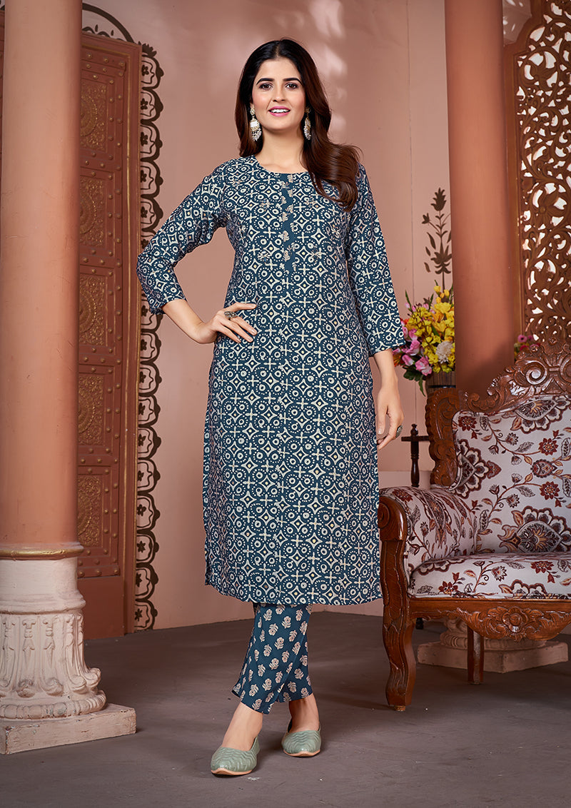 Teal silk designer kurti featuring intricate embroidery and mirror work detailing