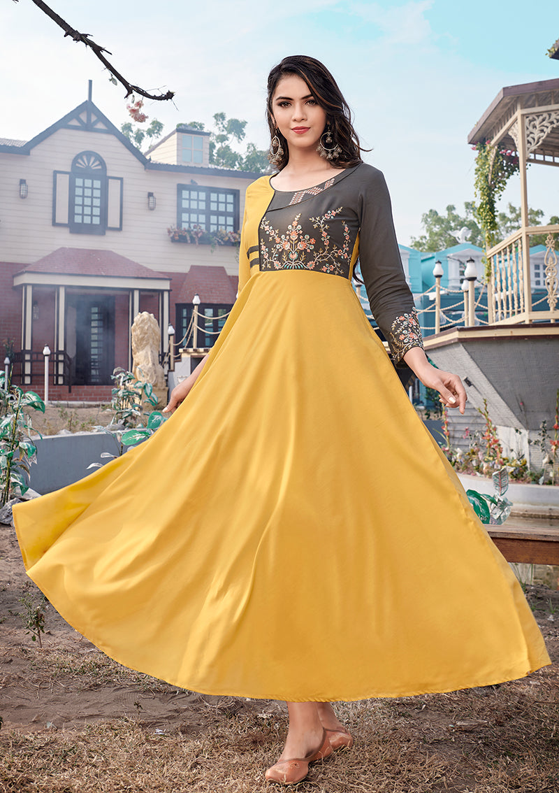 Mustard rayon designer kurti with intricate ethnic embroidery