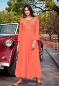 Peach designer kurti with detailed ethnic embroidery in soft rayon fabric