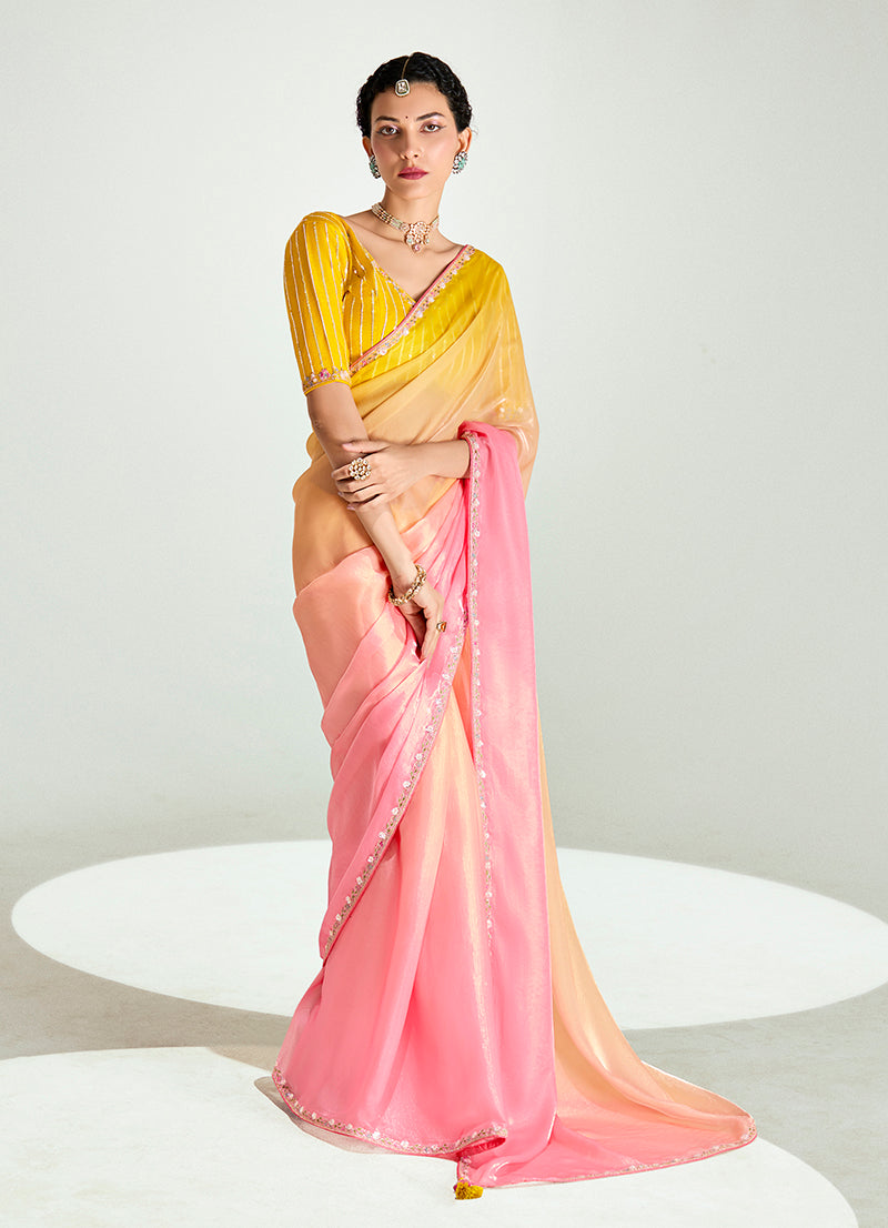Pink and yellow organza tissue saree featuring sequin embroidery for engagement wear