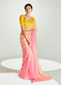 Pink and yellow organza tissue saree featuring sequin embroidery for engagement wear