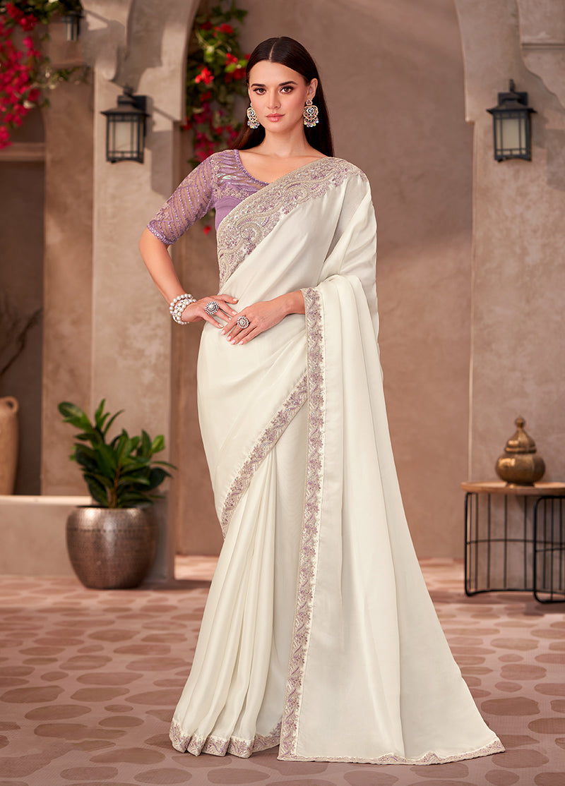 White georgette party wear saree with golden embroidered border