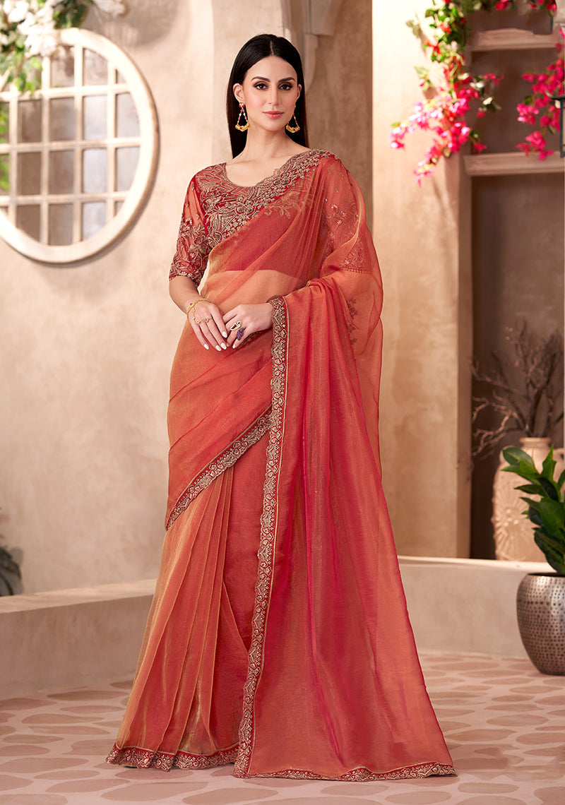 Rust tissue silk saree with intricate embroidery work for parties