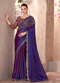 Violet chiffon silk party wear saree with floral embroidery and lace border