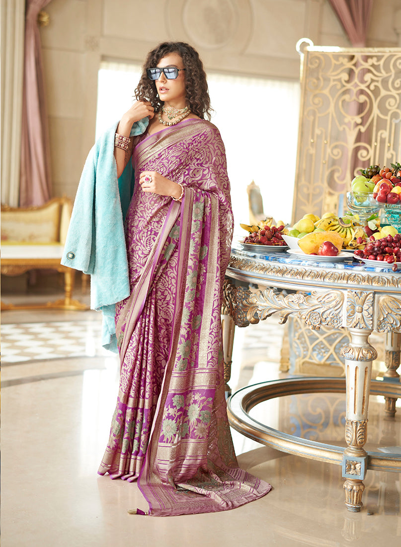 Magenta georgette saree featuring intricate fancy foil print work and a classic drape.