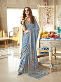 Light blue georgette saree accented with shimmering metallic foil print work.
