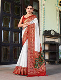 Elegant white Lucknowi viscose georgette saree with subtle foil print
