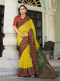 A vibrant yellow Lucknowi viscose georgette saree featuring delicate foil print details.