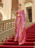 A beautiful multi-color satin saree featuring elegant woven prints and a luxurious sheen for formal ethnic wear.
