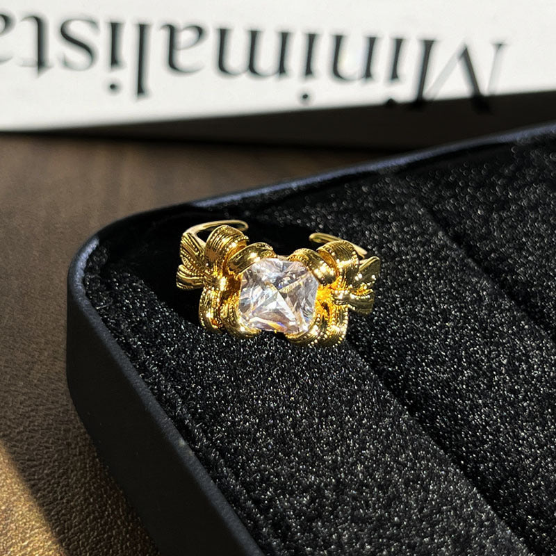 Gold open-band ring with geometric micro stone inlays