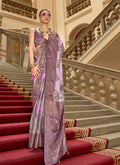 A beautiful multi-color satin saree featuring elegant woven prints and a luxurious sheen for formal ethnic wear.