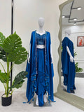 A blue satin silk western dhoti set featuring thread sequence work and a matching shrug