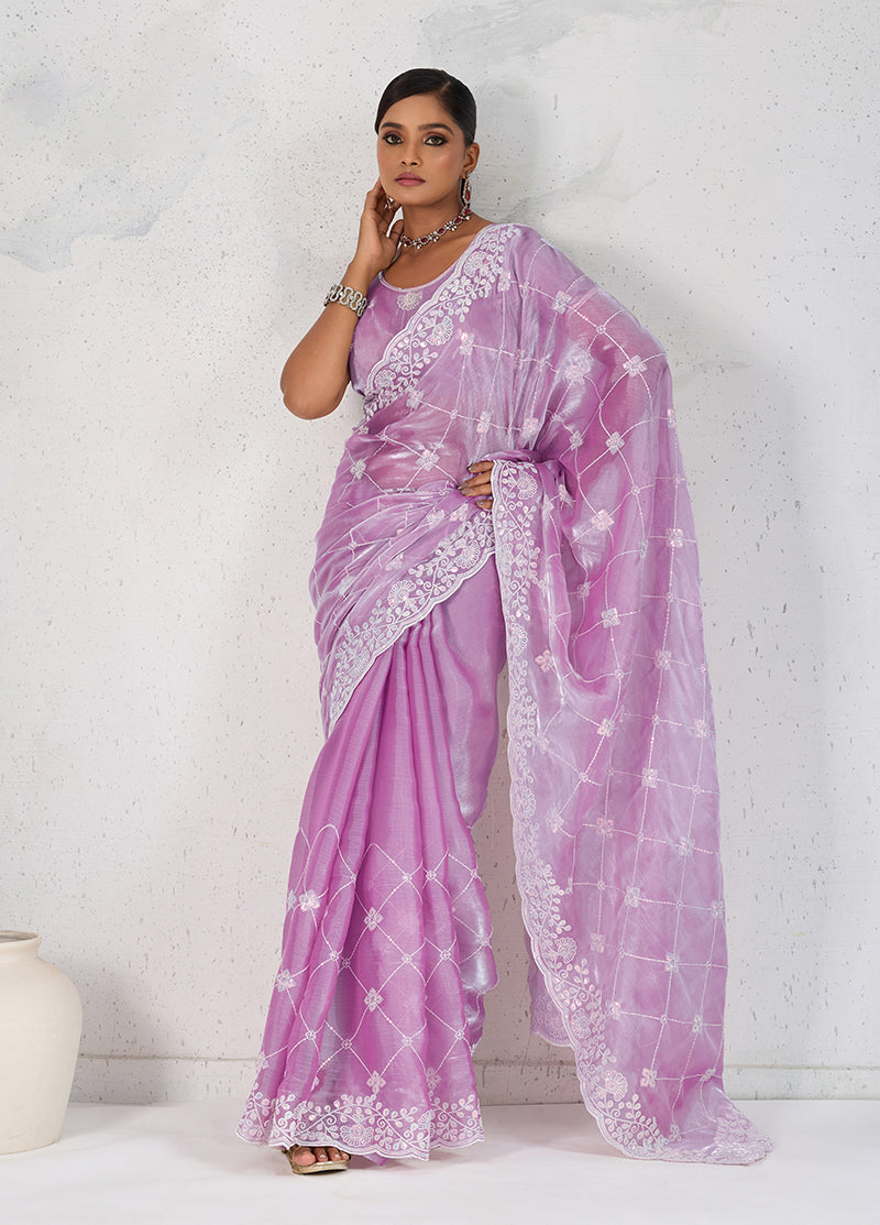 Lavender soft burberry saree adorned with intricate thread work