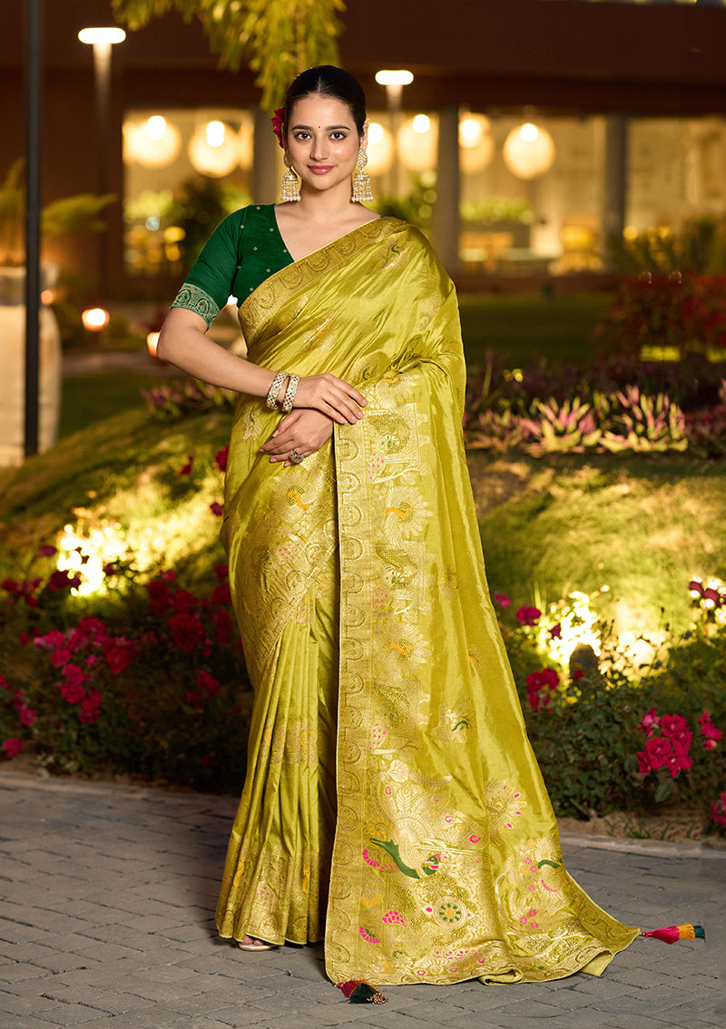Bright parrot green Dola silk saree with intricate Meenakari woven details