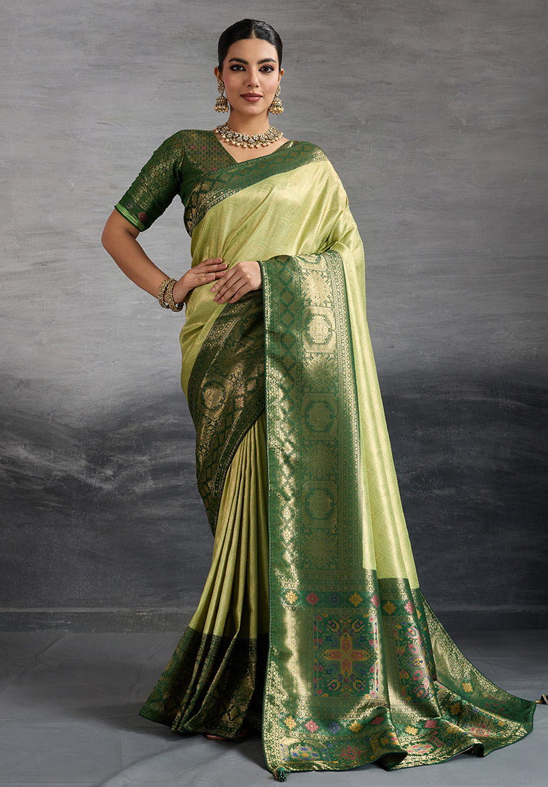 Parrot Green soft Kanjivaram silk saree with intricate Meenakari weaving details