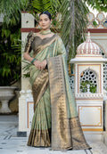 Light Cyan Kanjivaram Silk saree with intricate Meenakari zari weaving and matching blouse.