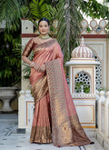 Elegant light red Kanjivaram silk saree with detailed Meenakari weaving and matching blouse piece