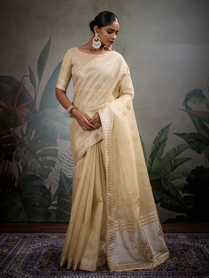 Classic Light Yellow Tissue Linen saree with intricate handcrafted details.
