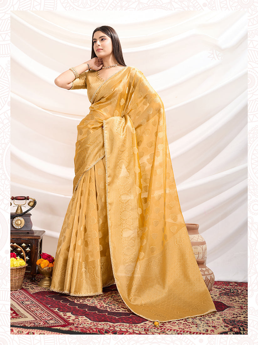 Elegant Light Yellow crush tissue saree with matching blouse piece for festive wear