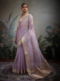 Light purple soft tissue silk saree with shimmering finish and matching tissue brocade blouse