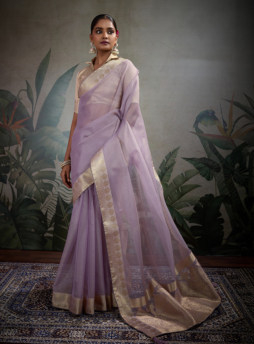 Light purple soft tissue silk saree with shimmering finish and matching tissue brocade blouse
