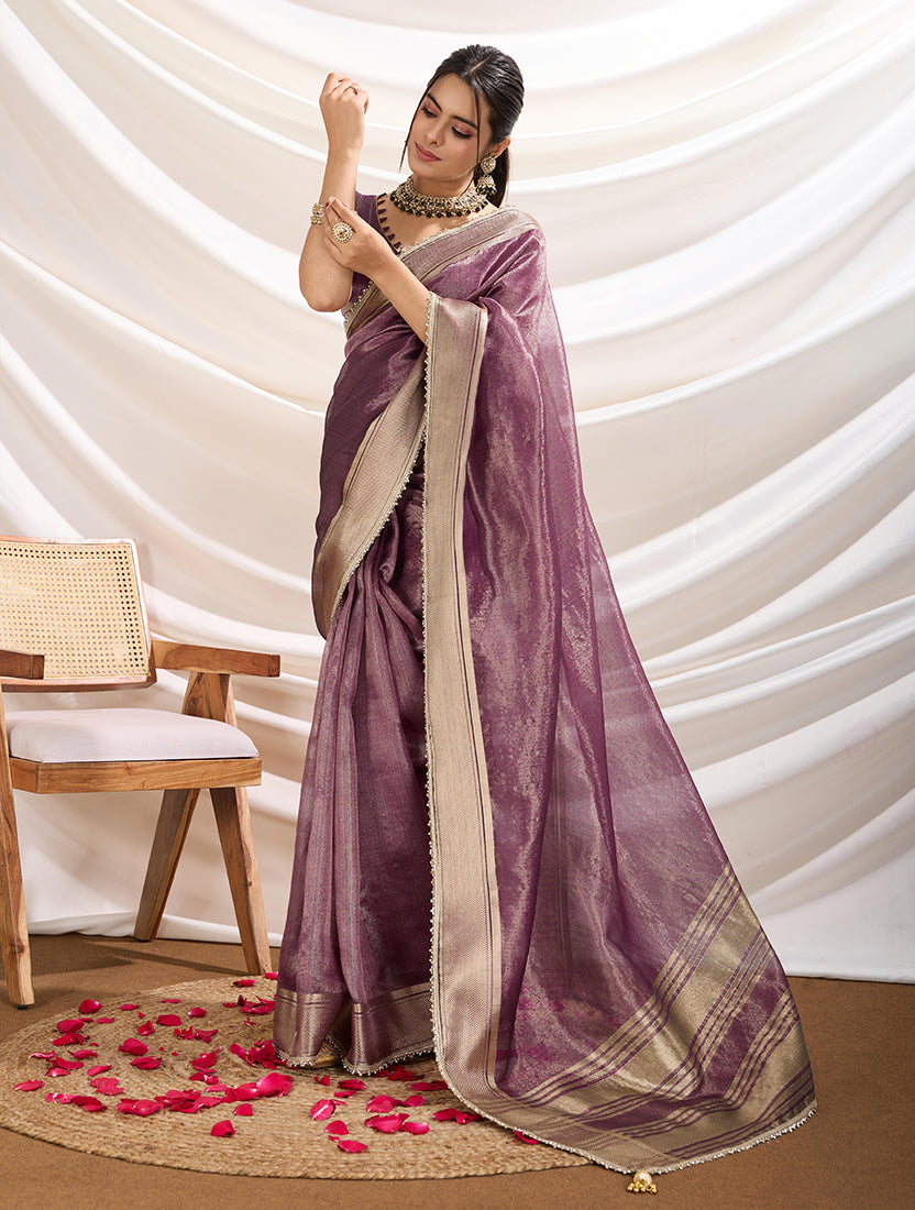 Plum colored soft linen tissue saree with designer border work and matching blouse
