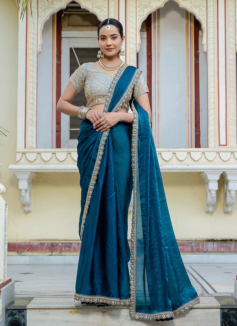 Monjolika Fashion Divine Teal Blue Satin Velvet Saree With Bewitching Blouse Piece