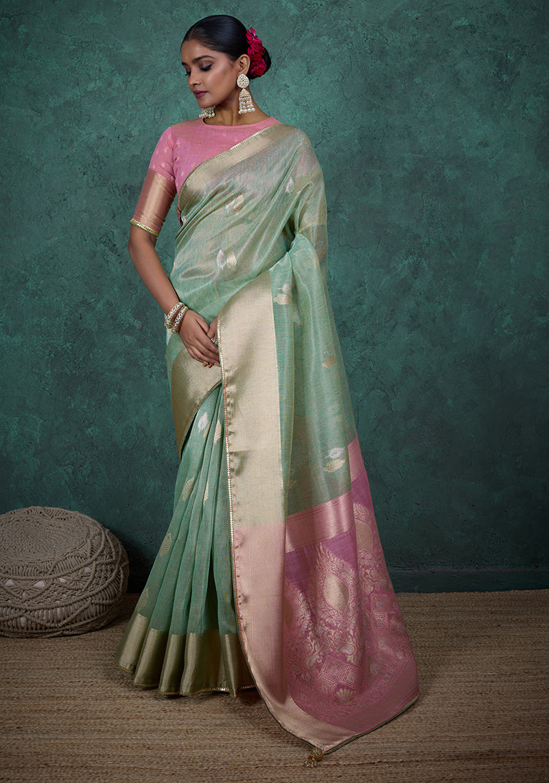 Light blue linen blend saree with shimmering woven sequins and blouse
