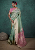 Light blue linen blend saree with shimmering woven sequins and blouse