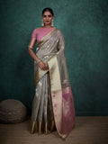 Elegant light grey linen blend saree with woven sequin work and matching blouse piece