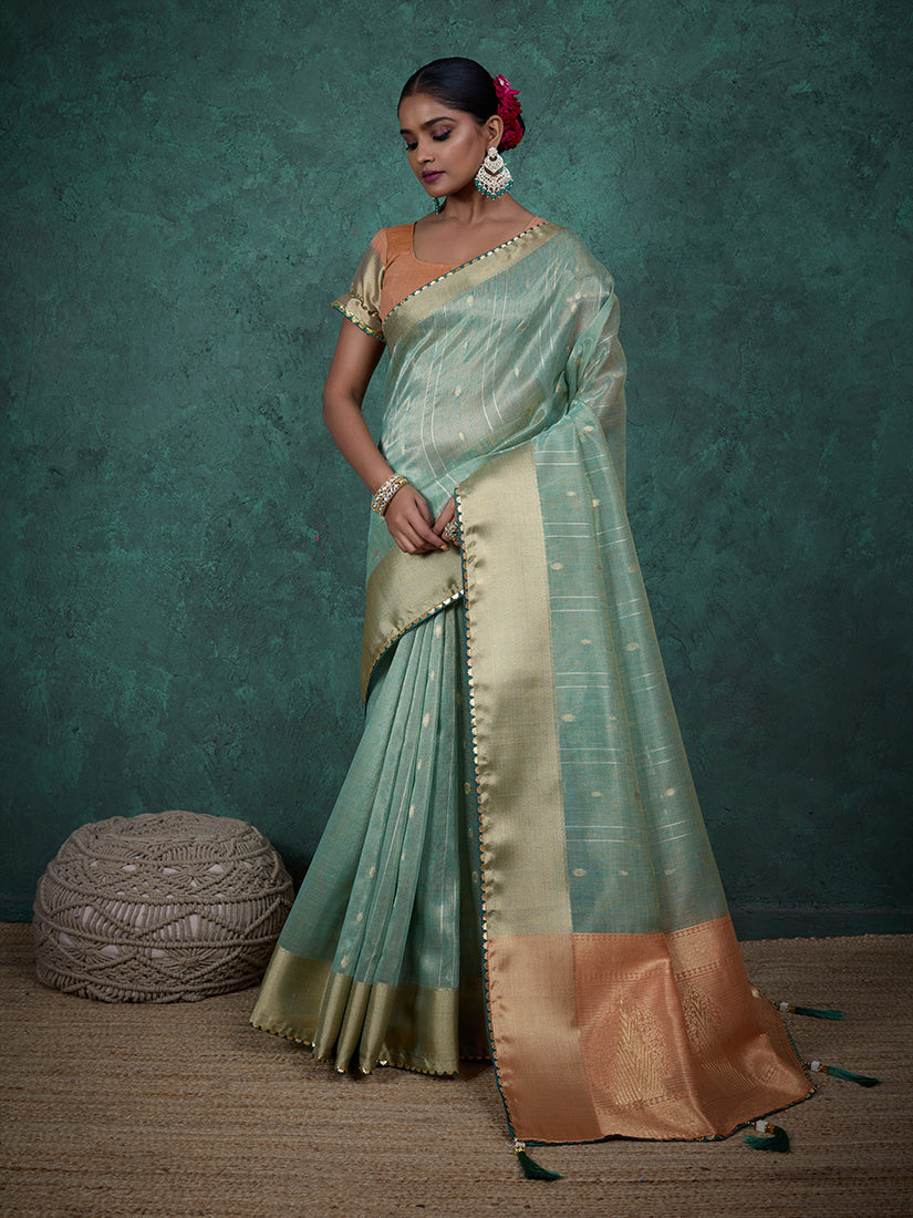 Sky Blue Linen Blend saree with woven sequin work and matching blouse